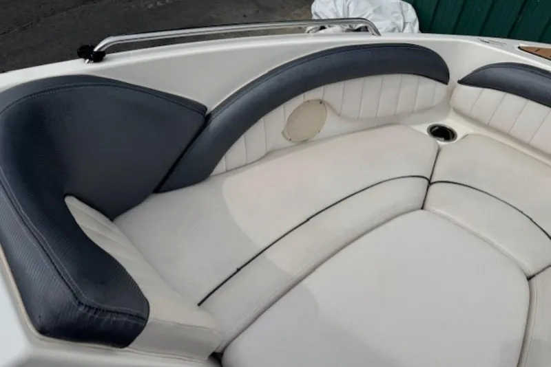 Slide: The Image of 2008 Yamaha Boats SX230 HO interior seating with white and dark upholstery. - 24