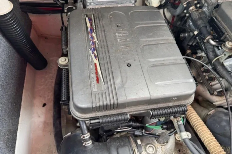Slide: The Image of 2008 Yamaha Boats SX230 HO engine compartment, showcasing detailed components and wiring. - 31