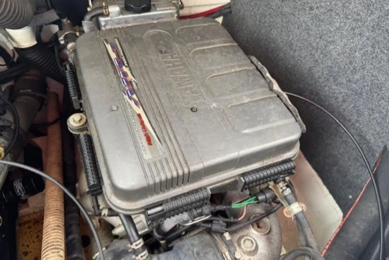 Slide: The Image of Engine compartment of a 2008 Yamaha Boats SX230 HO, showcasing mechanical components. - 32