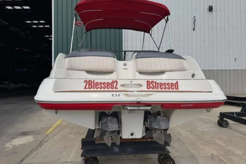 Slide: The Image of 2008 Yamaha Boats SX230 HO with red canopy, docked, featuring "2Blessed2 BStressed" text. - 7