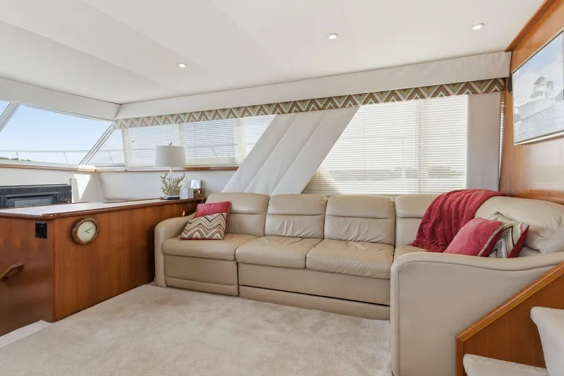 Slide: The Image of Luxurious interior of 1998 Carver 445 Aft Cabin Motor Yacht with beige leather sofa. - 20