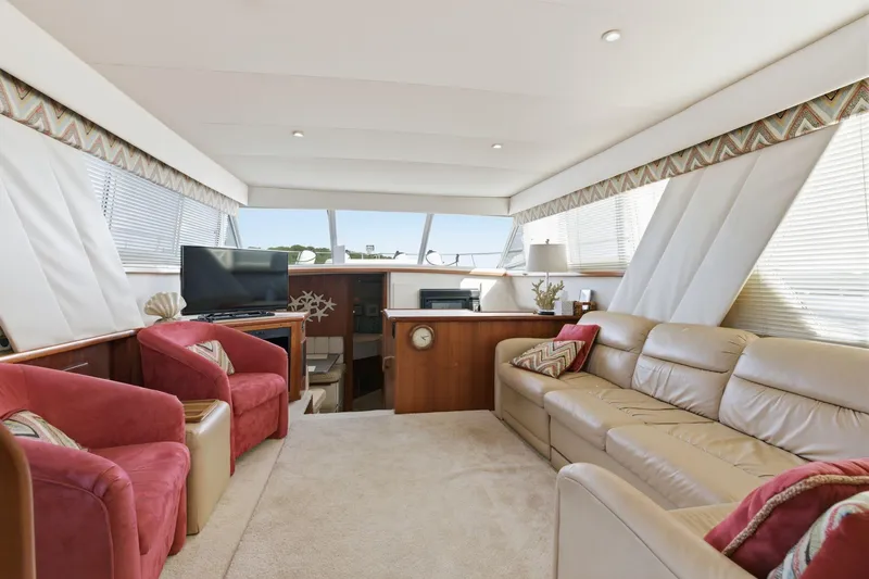 Slide: The Image of Luxurious interior of 1998 Carver 445 Aft Cabin Motor Yacht with plush seating and modern amenities. - 21
