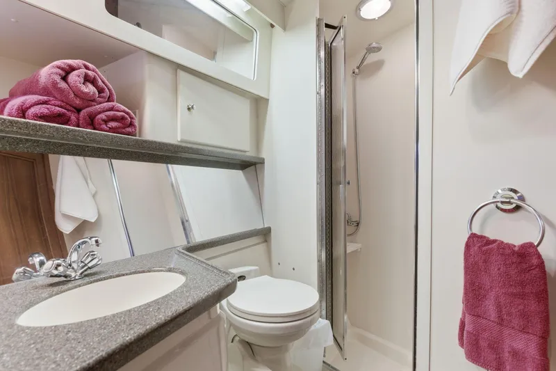 Slide: The Image of Luxurious bathroom in 1998 Carver 445 Aft Cabin Motor Yacht with modern amenities. - 31