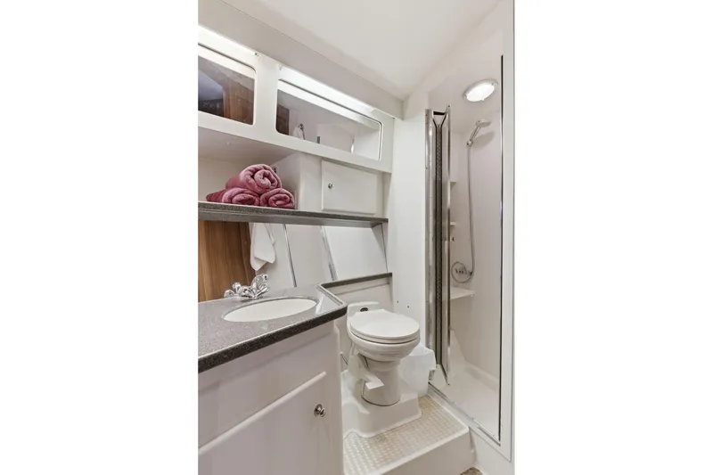Slide: The Image of Bathroom of 1998 Carver 445 Aft Cabin Motor Yacht with shower and vanity. - 32