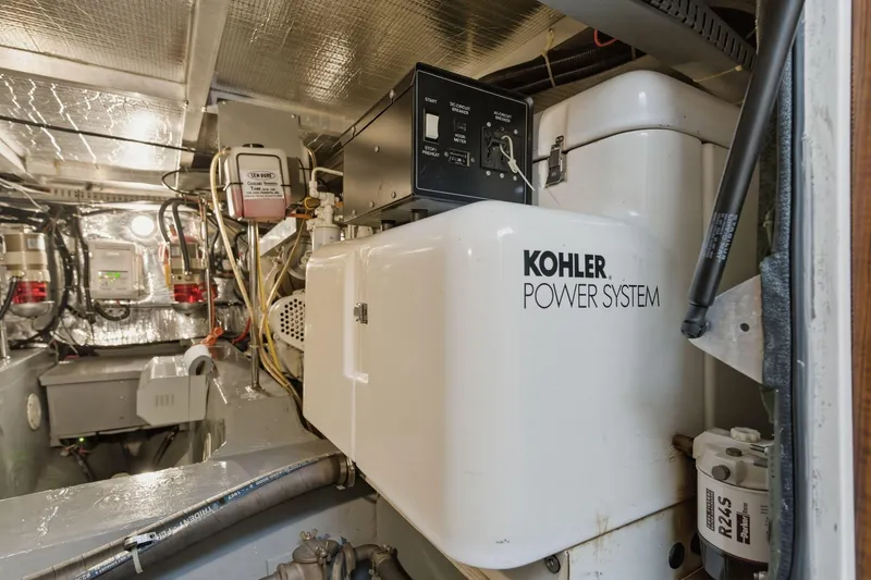 Slide: The Image of Engine room of 1998 Carver 445 Aft Cabin Motor Yacht with Kohler power system. - 44