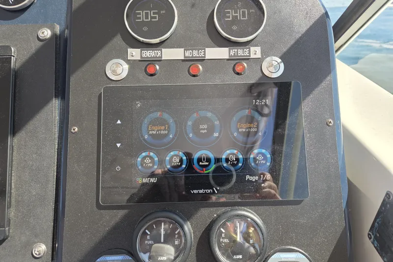 Slide: The Image of Instrument panel of a 1998 Tiara Yachts 3500 Open, displaying engine and bilge information. - 39