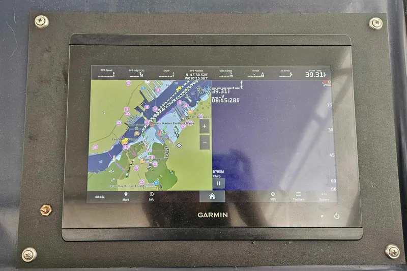 Slide: The Image of Garmin navigation display on 1998 Tiara Yachts 3500 Open, showing nautical charts and data. - 41