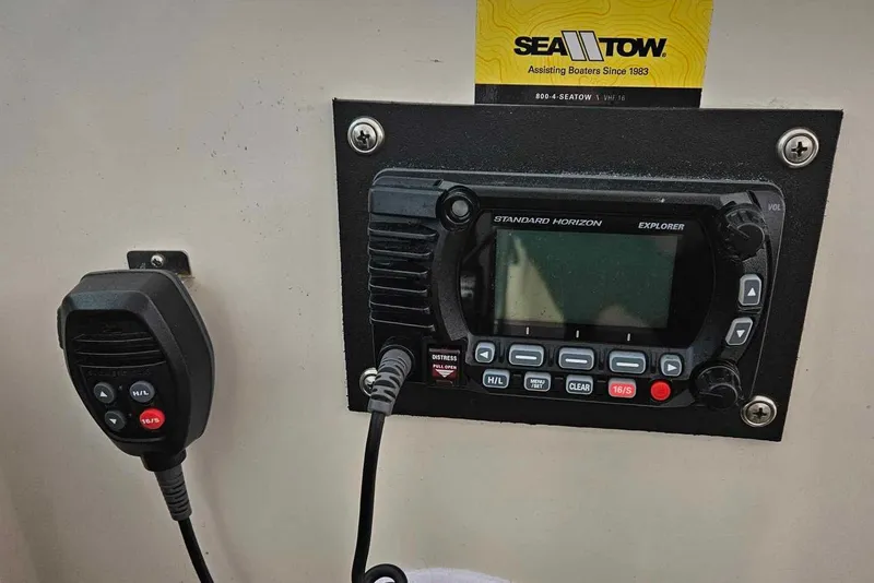 Slide: The Image of VHF radio system on a 1998 Tiara Yachts 3500 Open, featuring Standard Horizon Explorer. - 42