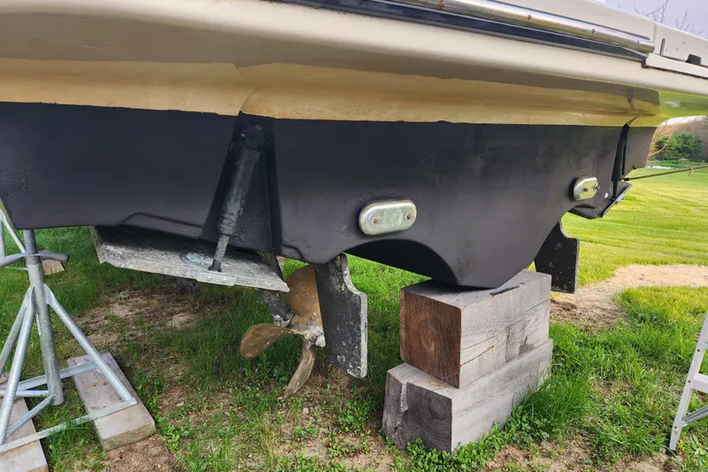 Slide: The Image of 1998 Tiara Yachts 3500 Open hull on blocks, showing propeller and rudder. - 46