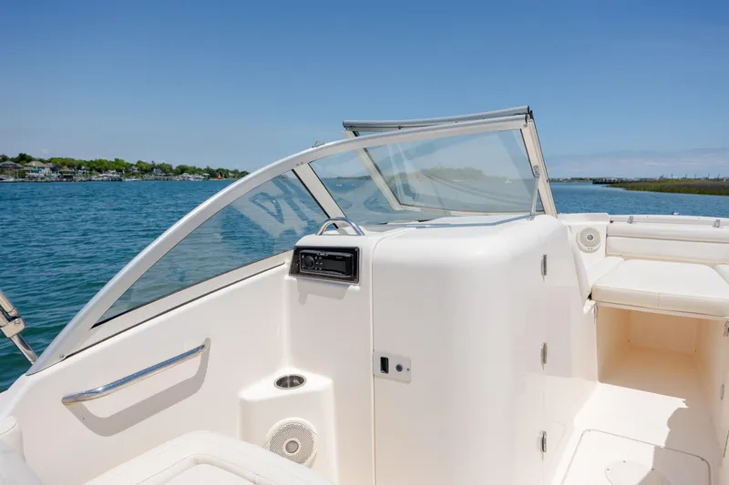 Slide: The Image of 2019 Grady-White Freedom 215 boat interior with open water view. - 20