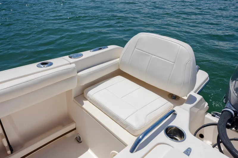 Slide: The Image of 2019 Grady-White Freedom 215 boat seat with ocean view. - 25