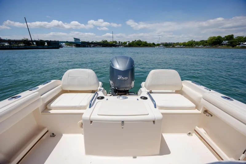 Slide: The Image of 2019 Grady-White Freedom 215 boat with Yamaha 250 engine on a sunny day. - 27