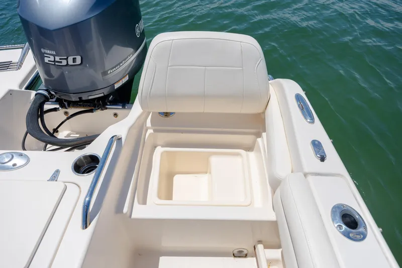 Slide: The Image of 2019 Grady-White Freedom 215 boat with Yamaha 250 engine, featuring seating and storage. - 31