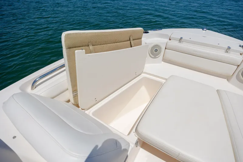 Slide: The Image of 2019 Grady-White Freedom 215 boat interior with storage compartment open. - 9