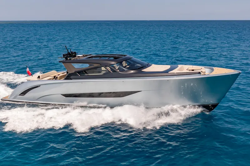 The Image of Luxury Wajer 77 yacht cruising on open sea, showcasing sleek design and elegance. - 0