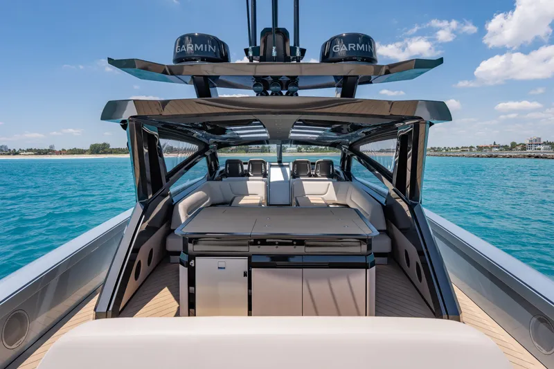 Slide: The Image of Luxurious Wajer 77 yacht interior with sleek design, cruising on clear blue waters. - 17