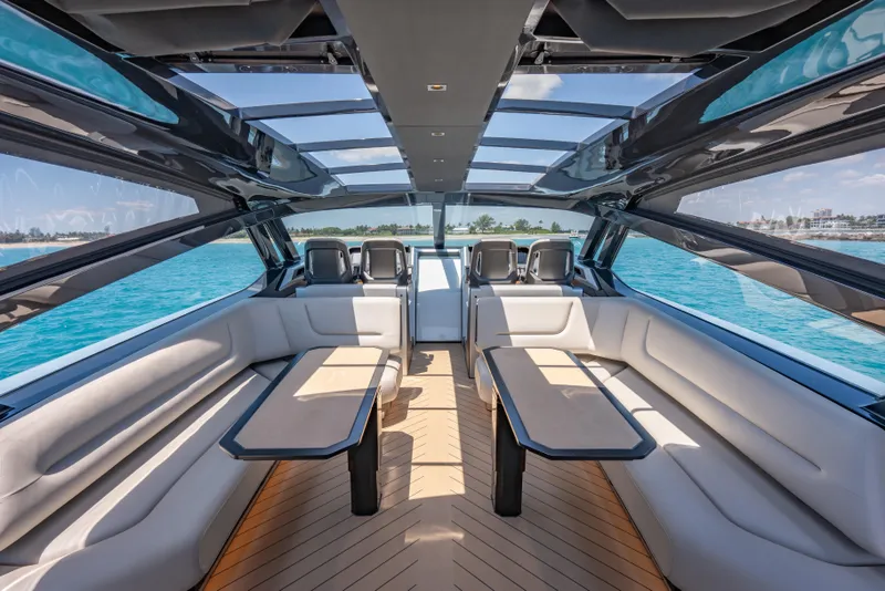 Slide: The Image of Luxurious interior of Wajer 77 yacht with panoramic windows and elegant seating. - 20