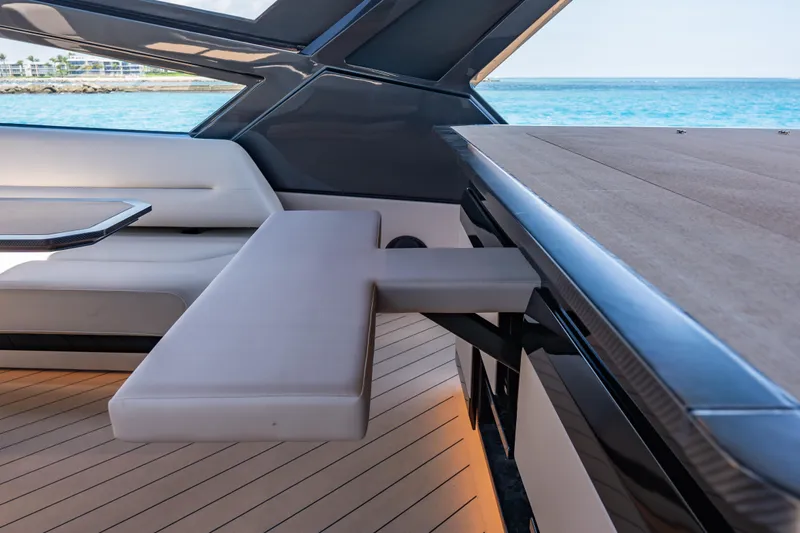 Slide: The Image of Luxurious interior of Wajer 77 yacht with sleek seating and ocean view. - 24