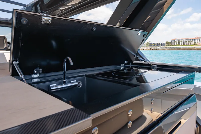 Slide: The Image of Outdoor kitchen on Wajer 77 yacht with sink and stove, ocean view. - 25