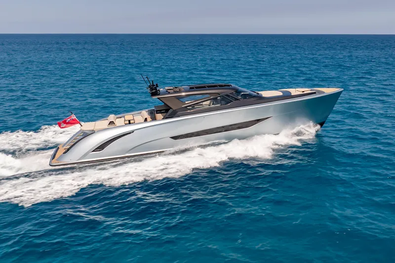 Slide: The Image of Luxury Wajer 77 yacht cruising on open sea, showcasing sleek design and elegance. - 3