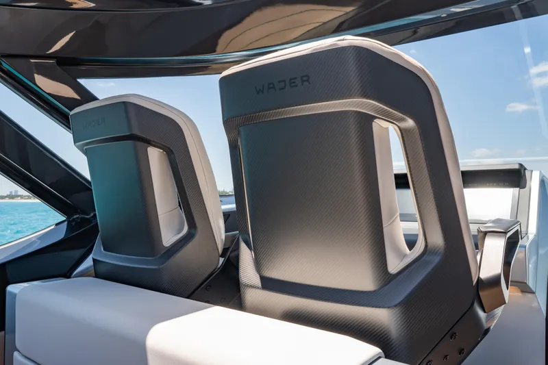 Slide: The Image of Luxury Wajer 77 yacht seats with sleek design and ocean view. - 30