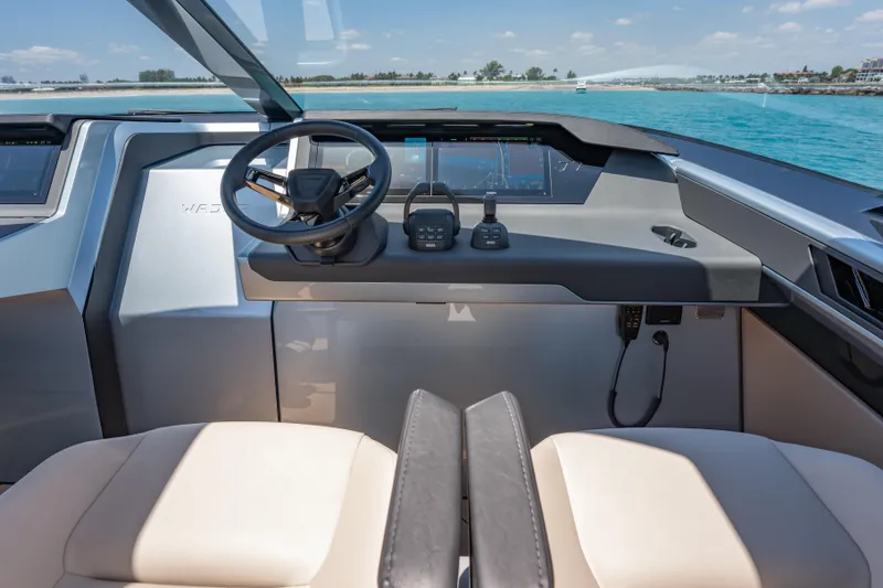 Slide: The Image of Helm of Wajer 77 yacht with modern controls and ocean view. - 31