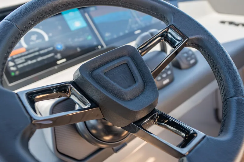 Slide: The Image of Steering wheel of Wajer 77 yacht with digital dashboard display. - 41