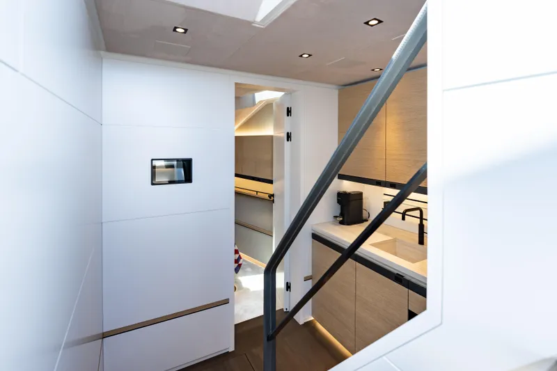 Slide: The Image of Luxurious interior of Wajer 77 yacht featuring modern kitchen design and sleek finishes. - 42