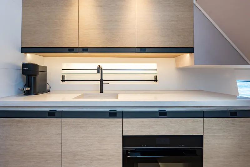 Slide: The Image of Modern kitchen interior on Wajer 77 yacht with sleek cabinetry and built-in appliances. - 45