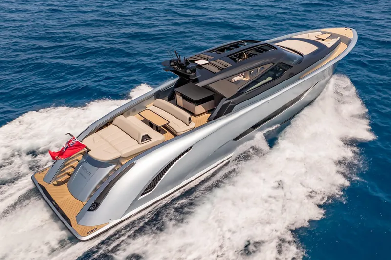 Slide: The Image of Luxurious Wajer 77 yacht cruising on open sea, showcasing sleek design and elegance. - 6