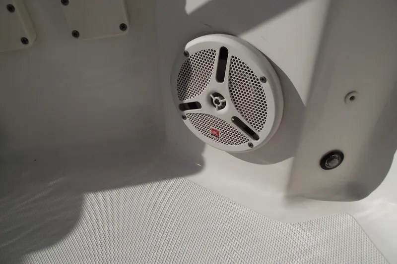 Slide: The Image of Speaker system on 2014 Sea Hunt Gamefish 25 boat interior. - 15
