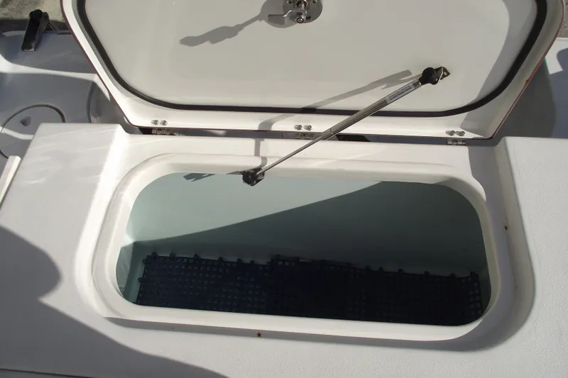 Slide: The Image of Open storage compartment on 2014 Sea Hunt Gamefish 25 boat. - 34
