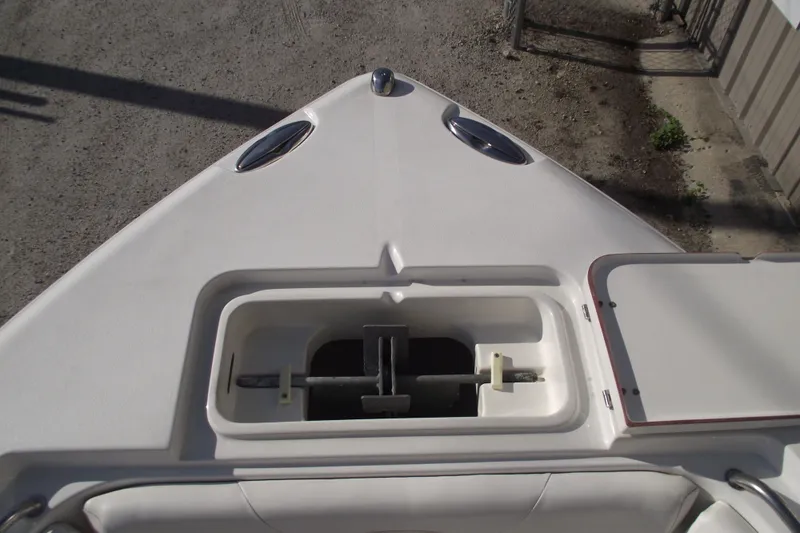 Slide: The Image of Bow view of 2014 Sea Hunt Gamefish 25, featuring anchor storage compartment. - 8
