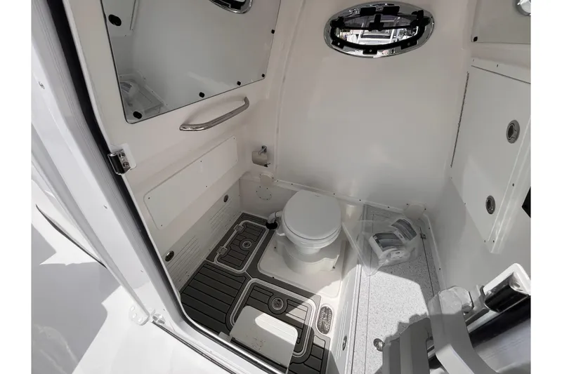 Slide: The Image of Interior of 2026 Tidewater 3100 Carolina Bay boat bathroom with modern fixtures. - 18