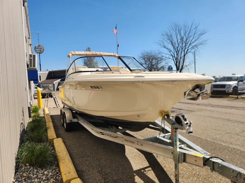 Slide: The Image of 2022 Scout 255 Dorado boat on trailer in sunny weather. - 4