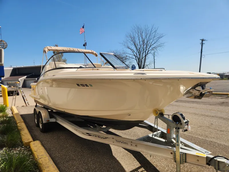 Slide: The Image of 2022 Scout 255 Dorado boat on trailer in sunny weather. - 5