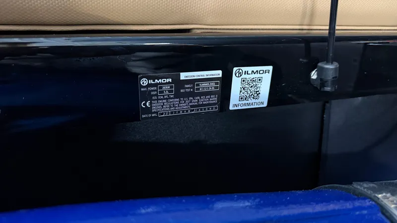 Slide: The Image of A label on a boat with Ilmor logo and QR code. - 95