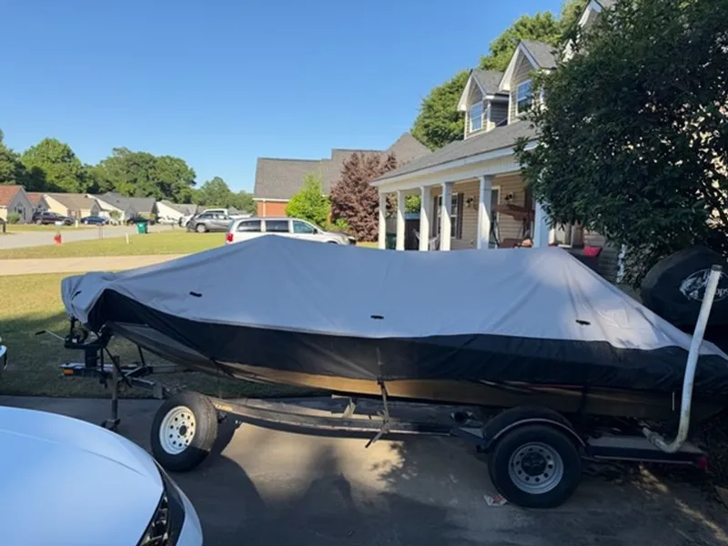 Slide: The Image of 2008 Bass Tracker Pro Team boat with cover on trailer. - 15