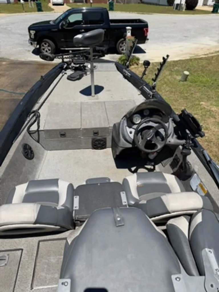 Slide: The Image of 2008 Bass Tracker Pro Team boat with steering console and seats. - 4
