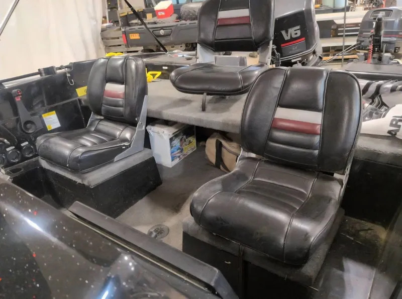 Slide: The Image of Interior of a 1997 Stratos 219 F boat with leather seats. - 7