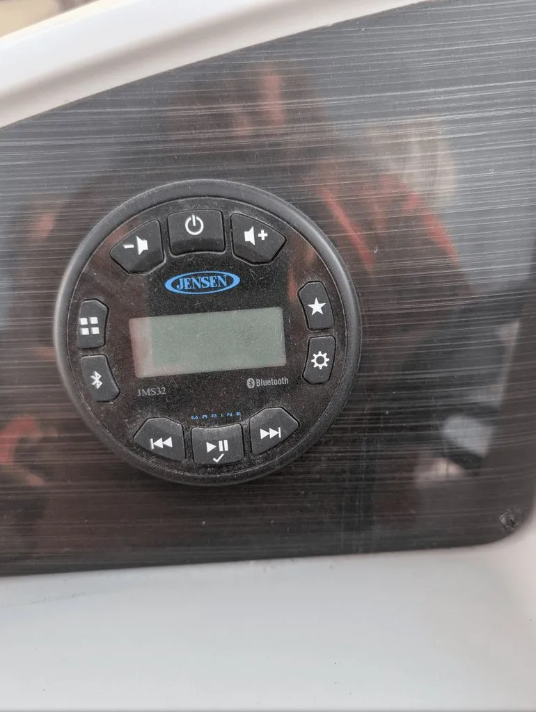 Slide: The Image of Jensen Bluetooth audio panel on 2022 Sylvan Mirage 820. - 4