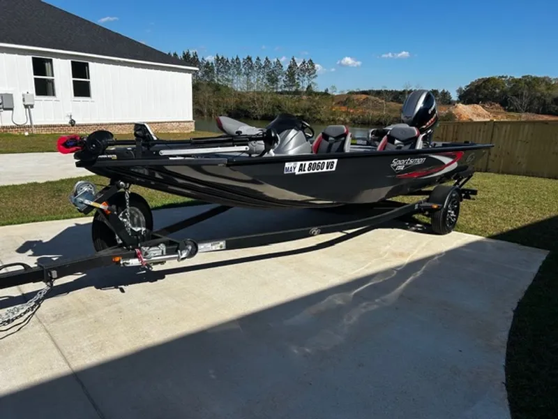 The Image of 2022 G3 Sportsman boat parked on trailer outdoors. - 0