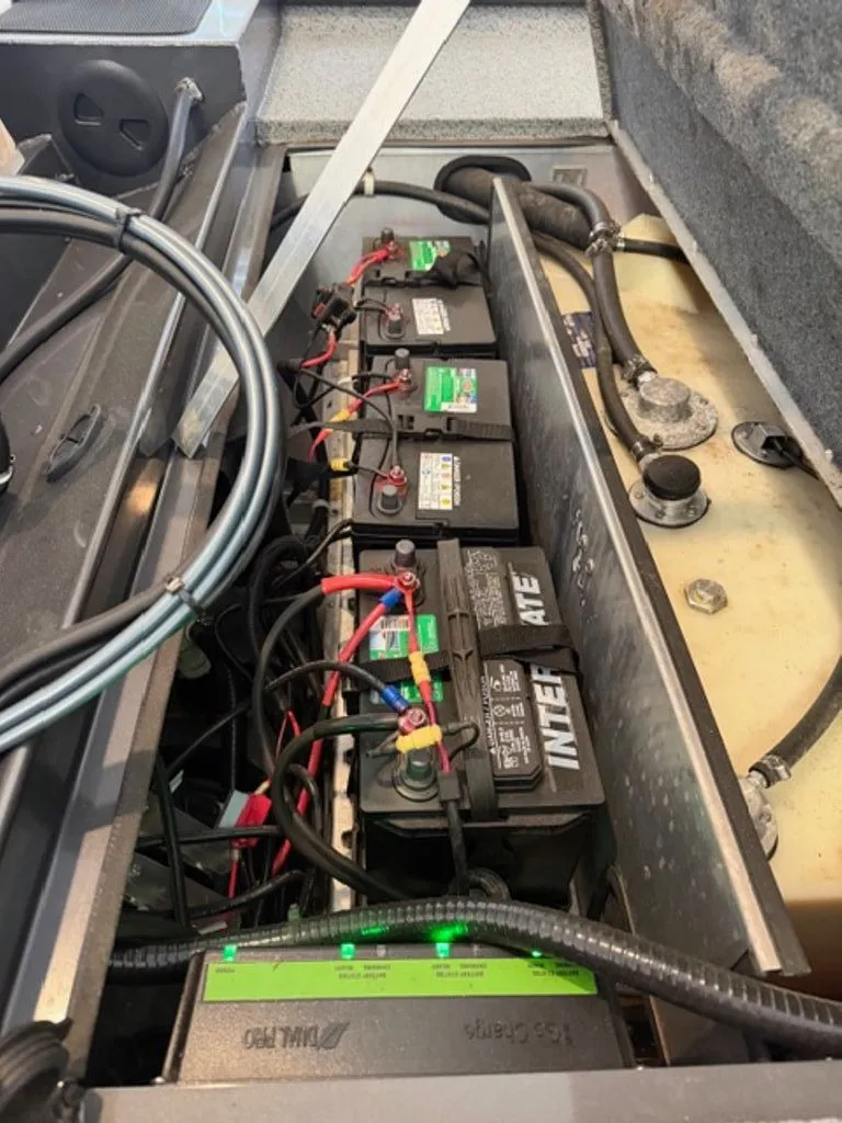 Slide: The Image of Batteries in G3 Sportsman 2022 boat engine compartment. - 13