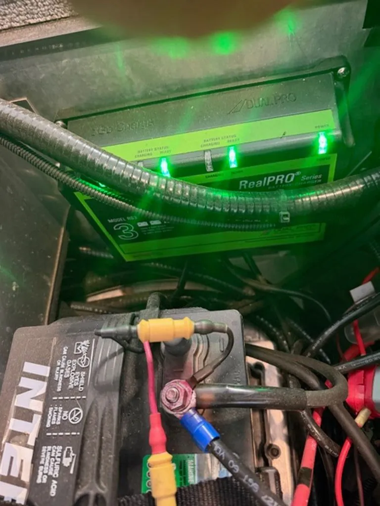 Slide: The Image of G3 Sportsman 2022 battery with charger and cables. - 14