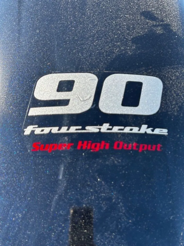 Slide: The Image of G3 Sportsman 2022 engine cover with 90 horsepower label. - 17