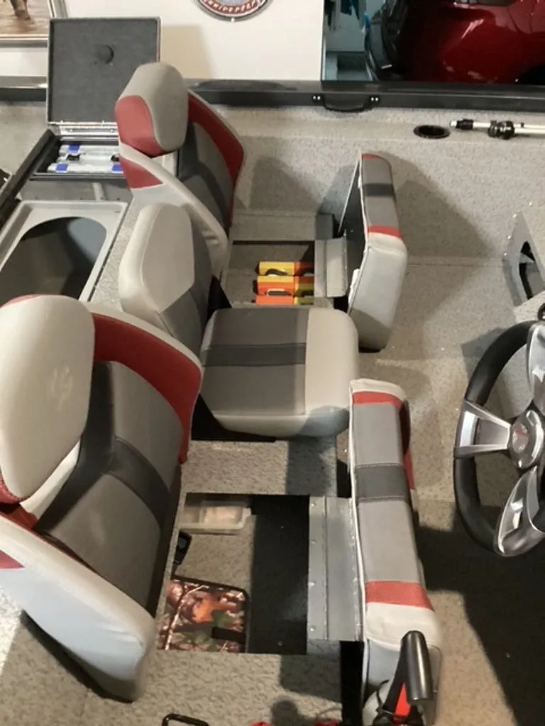 Slide: The Image of Interior of a 2022 G3 Sportsman boat with gray and red seats. - 3