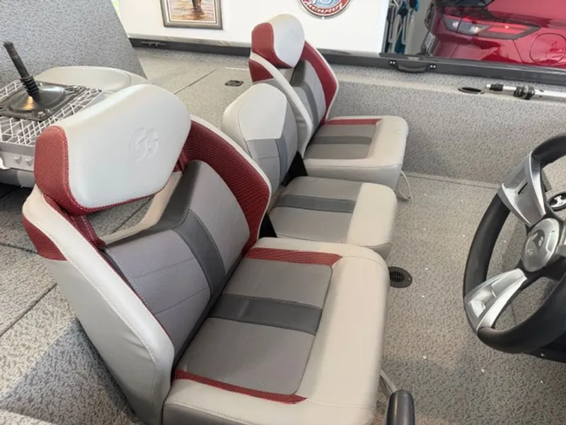 Slide: The Image of Interior of a 2022 G3 Sportsman with gray and red seats. - 4