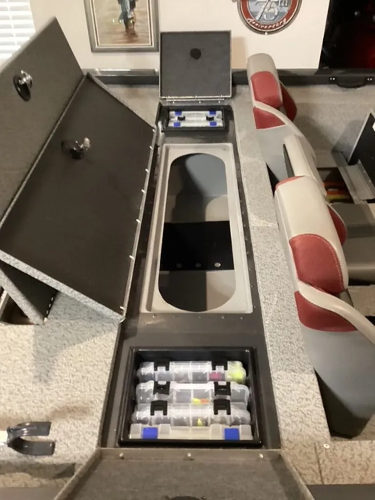 Slide: The Image of Interior view of a 2022 G3 Sportsman boat with storage compartments. - 6