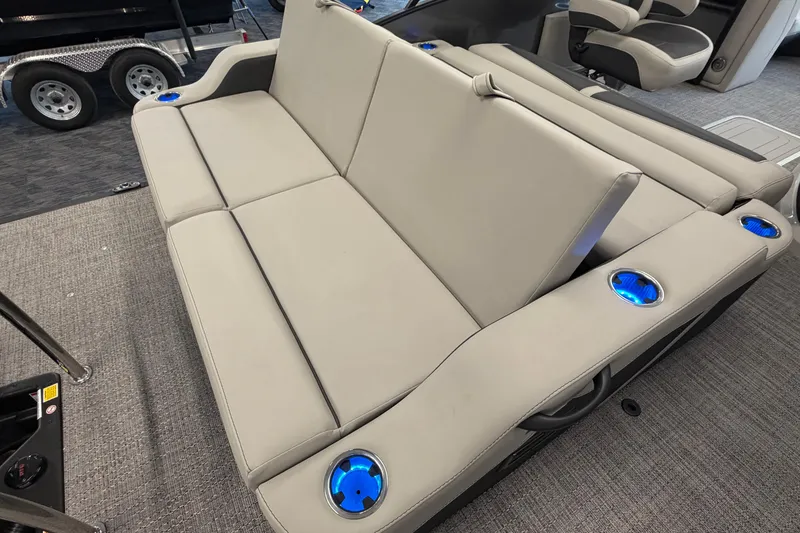 Slide: The Image of Luxurious seating on 2025 Barletta Cabrio 22UC boat with illuminated cup holders. - 10