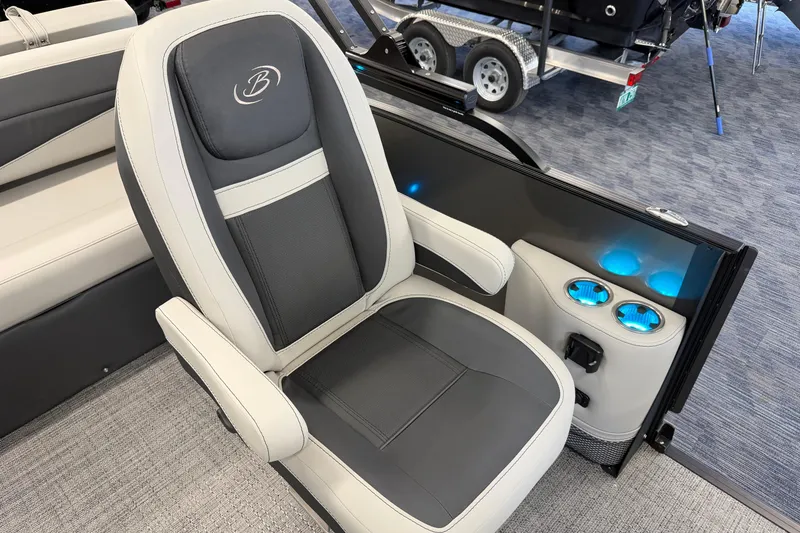 Slide: The Image of 2025 Barletta Cabrio 22UC boat seat with illuminated cup holders and sleek design. - 17